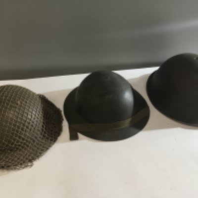 A slightly larger Military helmet cirica 1945 Mk II used possible on the D Day landing and two other conforming military helmets (3)