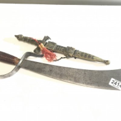 An Antique steel Indian Machete type steel knife with a wood grip and one other ornamental dagger (2)