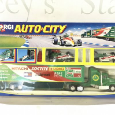A Boxed Corgi Auto City Team Lotus.