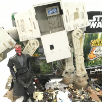 A Collection of Modern Star Wars Figures. A Boxed At-At (Parts Missing). Board Games And Empty Boxes.