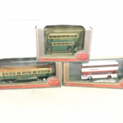 A box containing various model busses to include Limited First Editions and Trux.