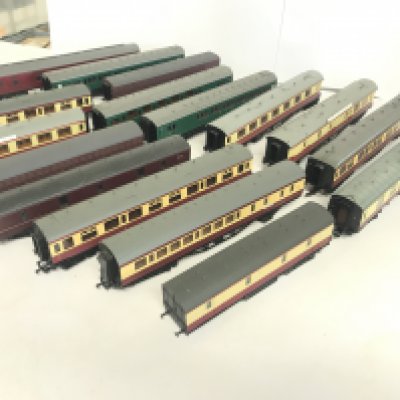 A box containing a large quantity of 00 gauge coaches.including Lima and Mainline.