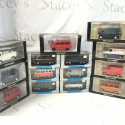 A collection of boxed diecast model vehicles comprising Ford Transit vans and Volkswagen camper vans and truck. No reserve