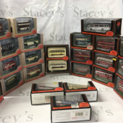 A collection of boxed diecast model buses by EFE. No reserve