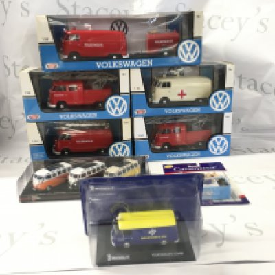 A collection of boxed model diecast Volkswagen vehicles including some emergency service vehicles. No reserve.