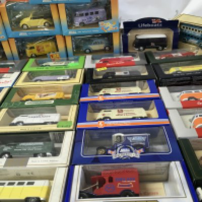 A collection in excess of 60 boxed diecast model vehicles predominately Volkswagen featuring many promotional livery . No reserve
