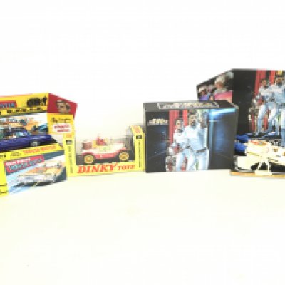 A Corgi Thrush Buster #497. A Dinky Merry Christmas Ford And A Corgi Buck Rogers Star Fighter With Figure In Repro Boxes.