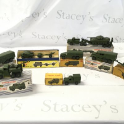 A collection of 8 boxed Dinky military vehicles plus unboxed 651 Centurion tank for 660 tank transporter. Boxes in worn condition. No reserve