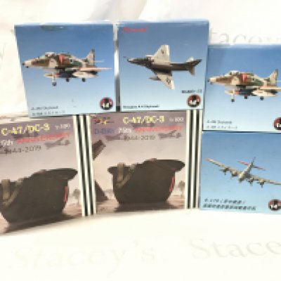 A box containing a quantity of scale model aircraft. No Reserve.
