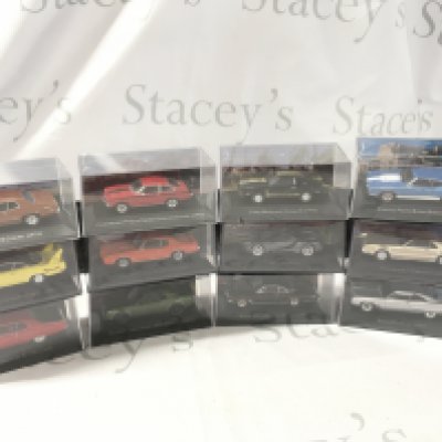 A collection of boxed diecast model cars mostly unopened by various manufacturers featuring American cars. No reserve