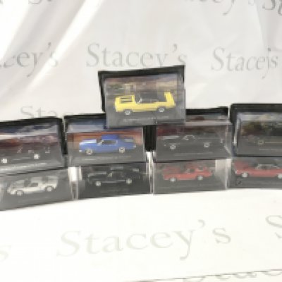 A collection of mostly unopened boxed model diecast cars. Featuring American cars by various manufacturers. No reserve.