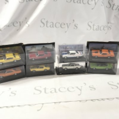 A collection of mostly unopened boxed diecast model cars by various manufacturers featuring American cars. No reserve