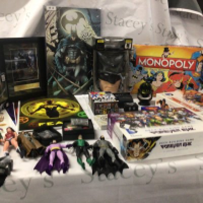 A Collection of DC box games plus figures and collectibles.