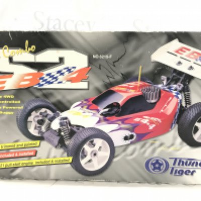 A Boxed Super Combo Thunder Tiger 1/8 Scale Remote Controlled Car.