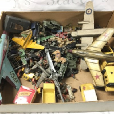 A Box Containing Playworn Toys Including Soldiers. And Aircraft. No Reserve.