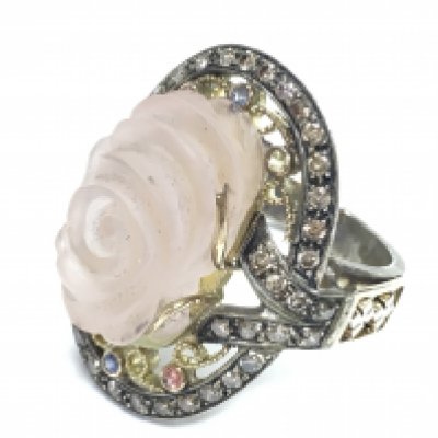 Large and impressive silver gilt ring set with a large carved rise quartz and coloured diamonds, boxed. Rose quartz 12.25ct. Diamonds 0.82ct. Ring size Approx U/V. Postage category A.