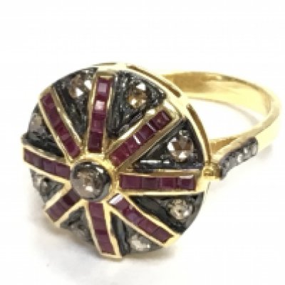 Silver gilt target style ring set with yellow and white rose cut diamonds and step cut rubies. Diamonds 0.70ct. Rubies 1.10ct. Ring size Approx N. Postage category A.