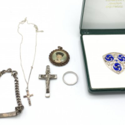 A collection of silver items including a silver and enamel brooch. Postage B