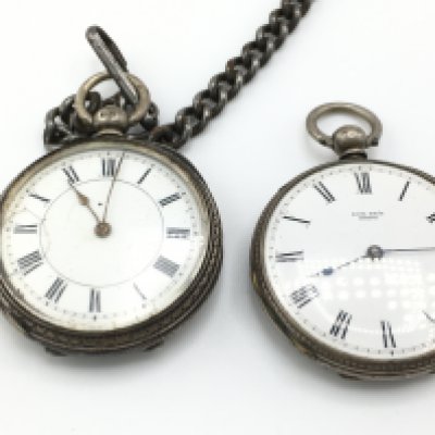 Two silver cased pocket watches not seen running. Both approx 38mm case. Postage B