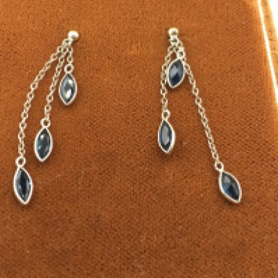 A pair of 9ct gold and sapphire earrings. Postage B