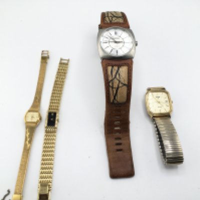 A collection of four dress watches including Diesel Seiko etc. Postage B