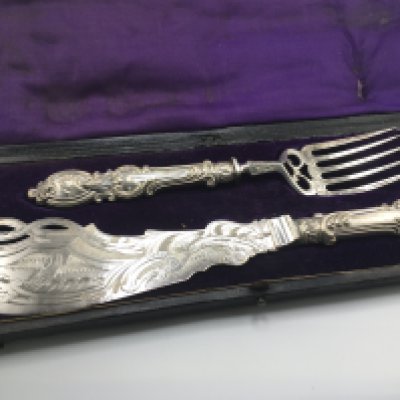 A cased fish set. Postage B. NO RESERVE