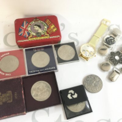 A Collection of commemorative British coins including a Five Shillings 1951 coin and others, a Coronation red tin box and some jewellery including a Swarovski pendant. Postage category B