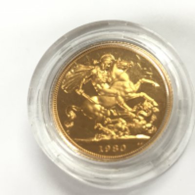 A 1980 full proof sovereign with case and COAPostage B