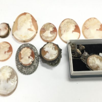A collection of cameos, some mounted in silver and yellow metal. Postage category b