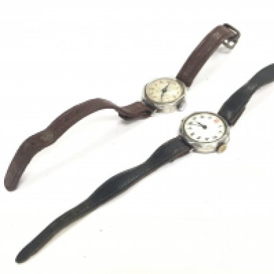 Two vintage silver cased ladies watches. Postage category A