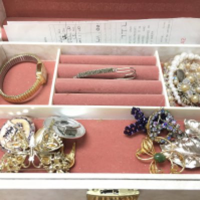 A mixed collection of costume jewellery including a silver necklace and a silver pair of earrings, brooches etc. NO RESERVE