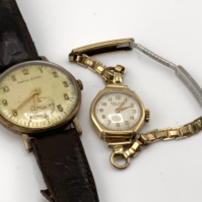 A Smiths Astral 9ct gold cased wristwatch together with a 9ct gold cased ladies watch. (A)