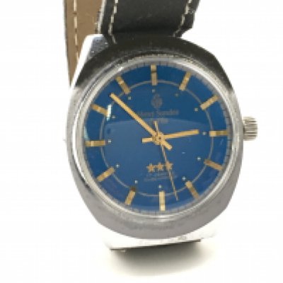 A vintage Henri sandoz and fils gents watch with blue dial. Approximately 35mm case. Seen running. Postage B. NO RESERVE