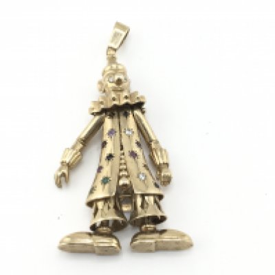 A 9ct gold clown set with assorted stones. 40.87g and 9cm long. Postage B
