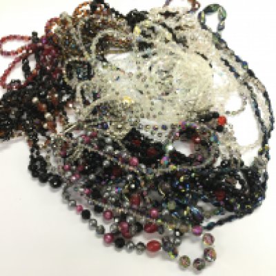 A large collection of assorted beaded jewellery. Postage B