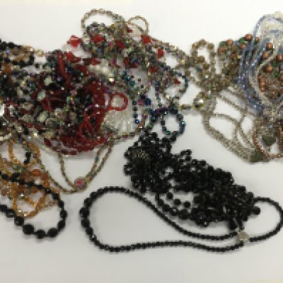A large collection of assorted beaded jewellery. Postage B