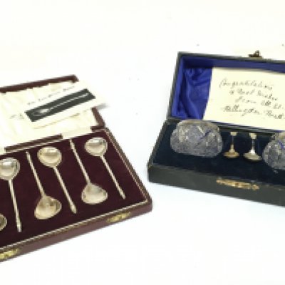 A Collection of silver hallmarked spoons and cruets. This lot cannot be posted