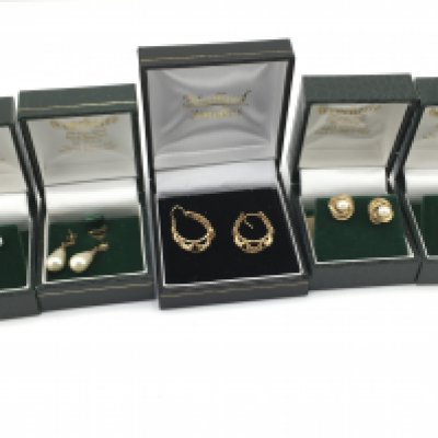 A collection of assorted earrings including 9ct gold examples. Postage B