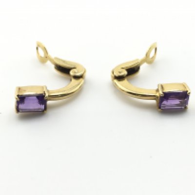 A pair of 14ct gold and amethyst clip on earrings. 4.64g Postage A