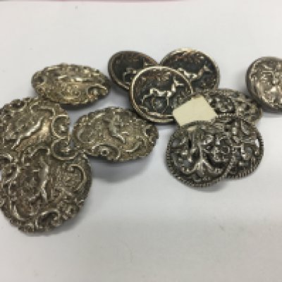A collection of silver buttons. Approx weight 72.11 grams.