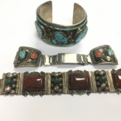 Two silver bracelets and one heavy silver bangle. Approx weight 273.07 grams.