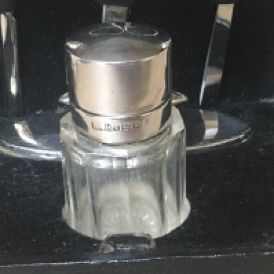 A silver cased manicure set and Vesta ..