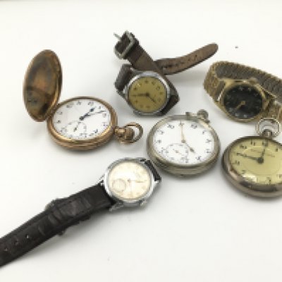 A Collection of vintage watches including Tissot (seen working) , Manhattan electra, Newmark and some pocket watches. This lot cannot be posted