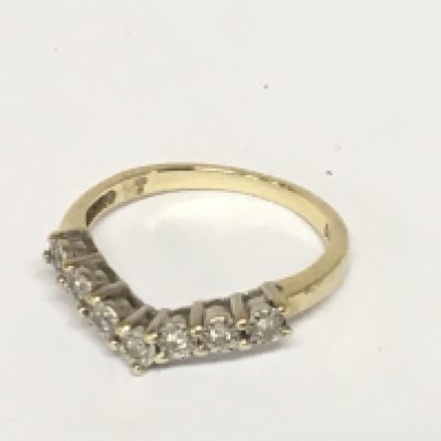 A 9carat gold ring set with a row of small diamonds. Ring size N. Weight 2g