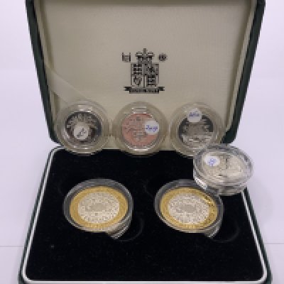 4 Sterling silver &pound;1 coins together with a cased pair of 1997-1998 UK silver proof &pound;2 coins. (A)