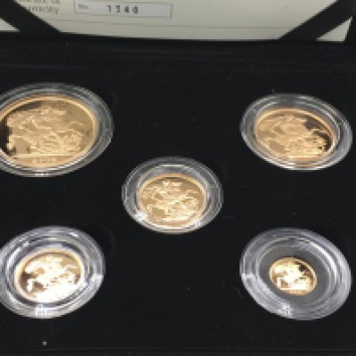2009 Royal mint gold proof five coin set with COA. Postage B