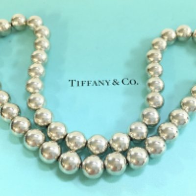 A Boxed Tiffany and Co necklace. Postage category B