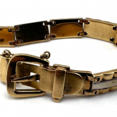 A heavy 14ct yellow and white gold bracelet with a buckle style clasp. 41.5g (A)