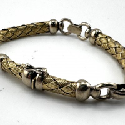 A heavy 14ct yellow and white gold weave design bracelet. 27.7g, 20cm (A)