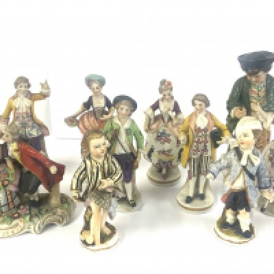 A small collection of small European porcelain figures. (D). NO RESERVE
